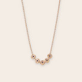 14k YG Five discs with sapphire