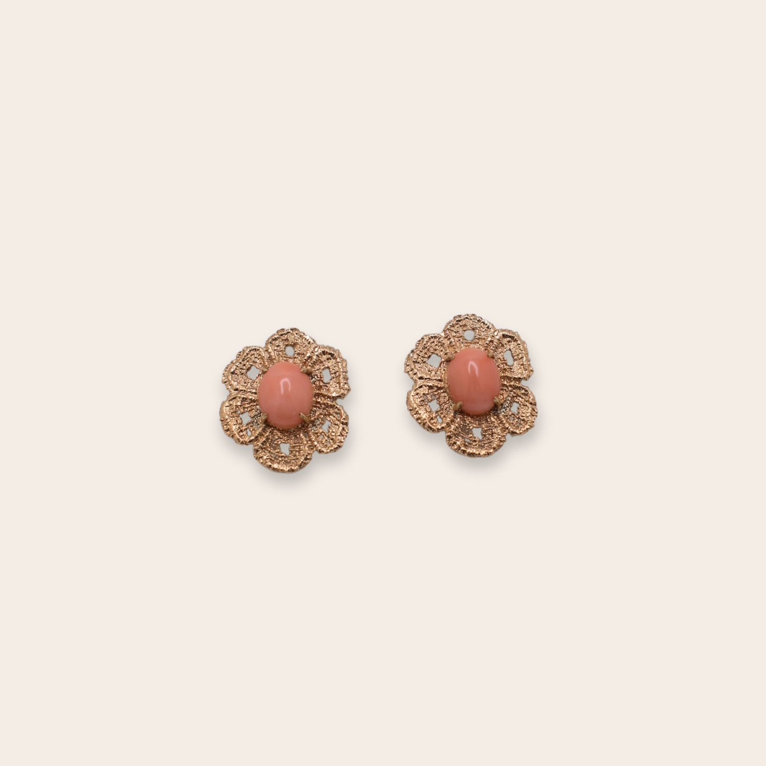 14K yellow gold with prong set coral