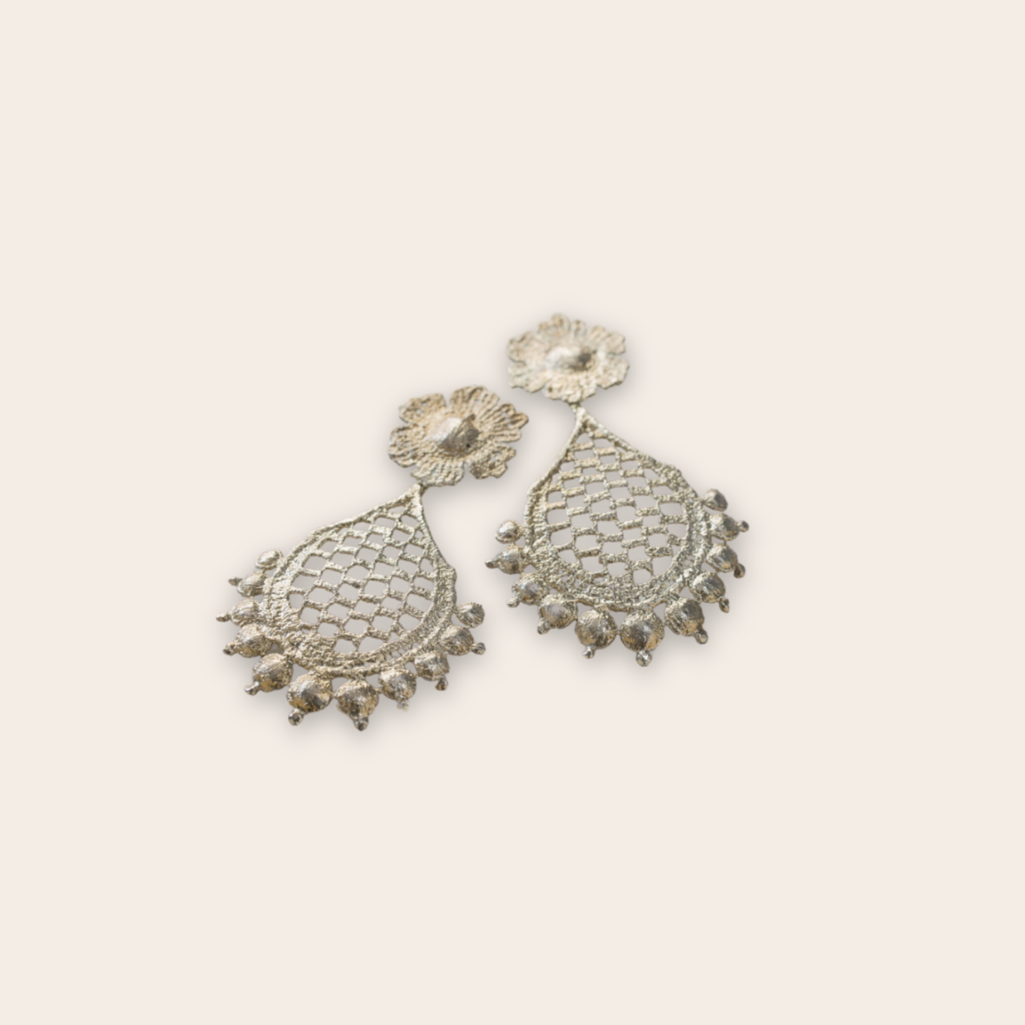 silver bloom and teardrop earring