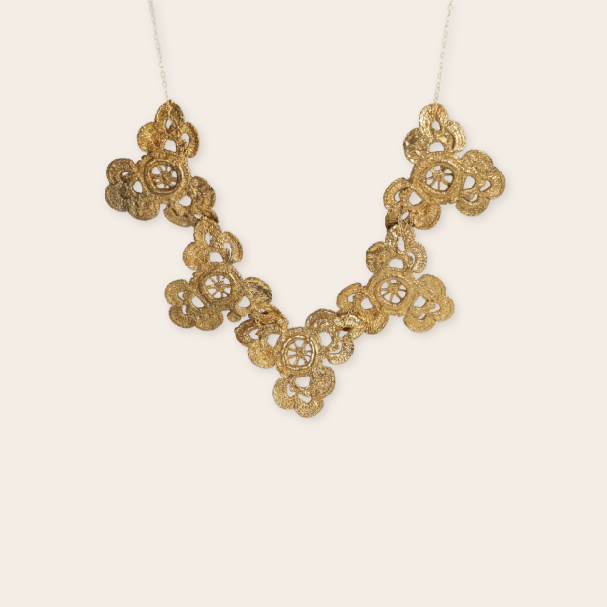 bronze trifoil necklace